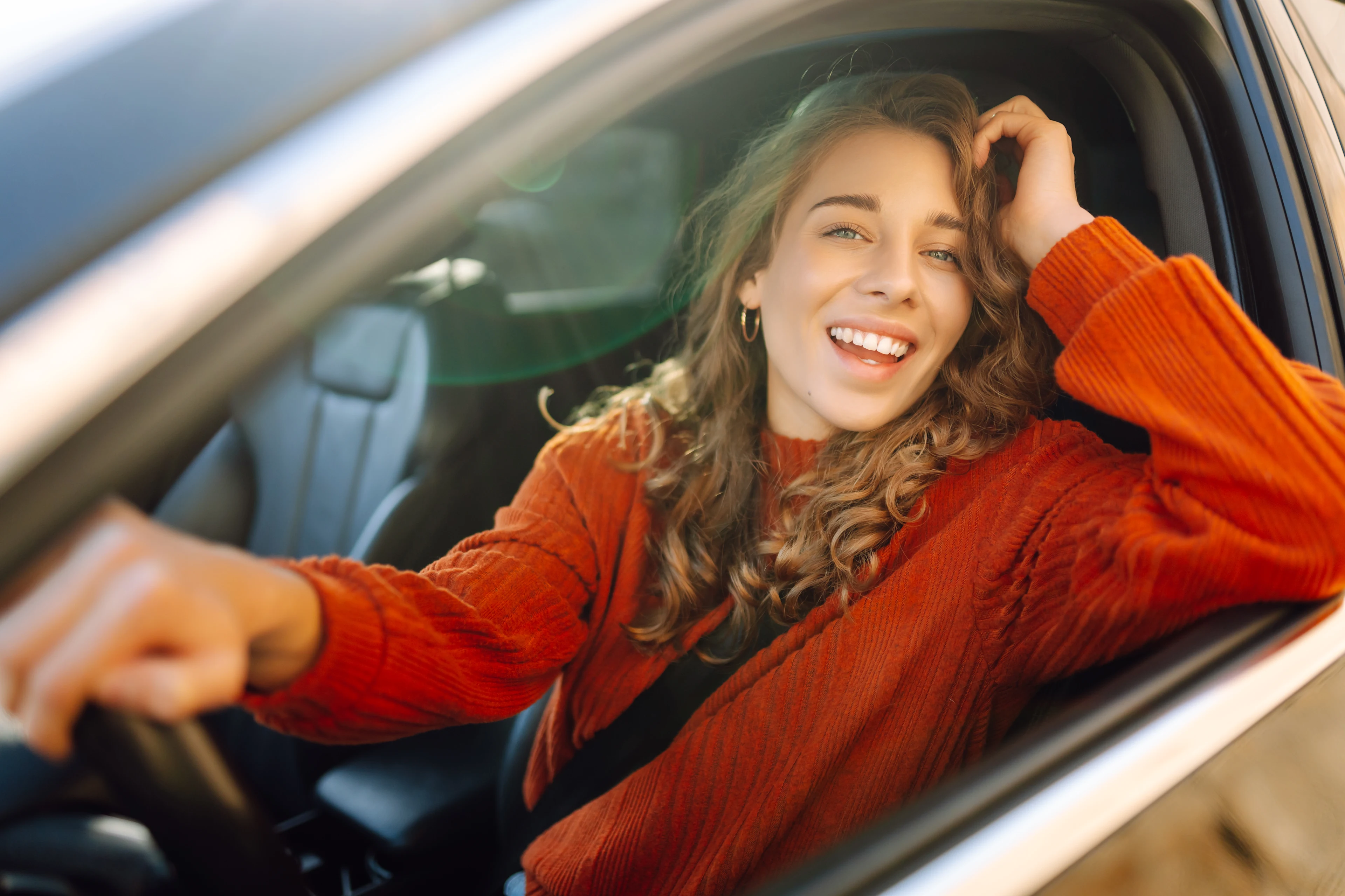 Bild Frau im Auto